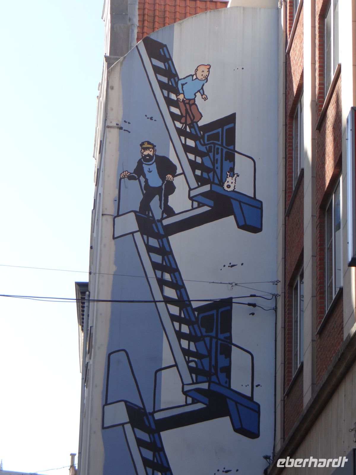 Brüssel, die Comicfiguren Tim und Struppi zieren eine Hauswand.  &ndash; &copy; Vivian Kreft (Eberhardt TRAVEL)