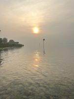 Bodenseerundreise 10.06.25   Stein am Rhein- Sonnenspiegelung in Bregenz &ndash; &copy; Renate Schuster (Eberhardt TRAVEL)