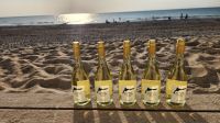 Abschiedsfeier am Strand mit Secco