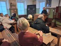 Der Lehrer am Pult