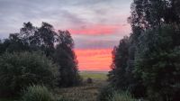 Sonnenaufgang über dem Saaler Bodden &ndash; &copy; Petra Hady (Eberhardt TRAVEL)