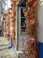 Obidos- Blumenschmuck an den Läden