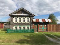 Auf dem Weg in den Ural: Die Holzhäuser in Tavalgi &ndash; &copy; Magda-Viola Hanke (Eberhardt TRAVEL)