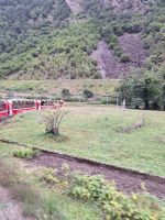 044 Ausflug mit dem Bernina Express - Fahrt über das Kreisviadukt in Brusio &ndash; &copy; Annette Probst-Weise (Eberhardt TRAVEL)