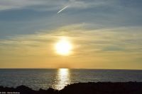 Wanderreise Menorca - Sonnenuntergang in Cala Blanca - Blick nach Mallorca