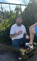 Schuhputzer bei der Arbeit