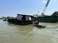 102 Wohnboote im Mekong.jpeg &ndash; &copy; Andy Nguyen (Eberhardt TRAVEL)