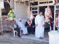 Männerschwatz beim Fleischer