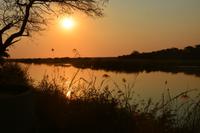 Sonnenuntergang am Okavango