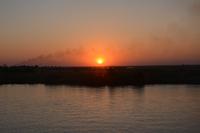 Sonnenuntergang bei der Bootsfahrt auf dem Chobe