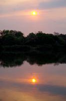 Bootsfahrt auf dem Okawango - Sonnenuntergang