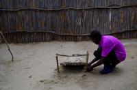 Besuch im Kulturdorf der Mashis - Fallensteller John