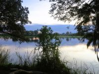 130 Die Sonne geht am Okavango auf