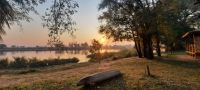 Sonnenaufgang am Okavango