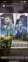Argentinien's Fußballerlegenden Messi und Maradonna an der Hauswand
