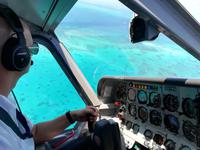 Ausblick aus dem Flugzeug - Rundflug über das Riff