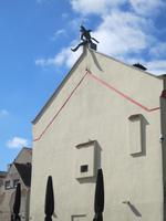 der Mann auf dem Dach