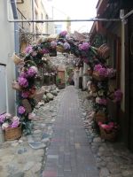 Kaunas - Eingang in der Garten des Restaurants Berneliu Užeiga