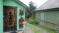 Blumenpracht am Holzhaus in Trakai