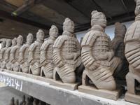 kniender Bogenschütze