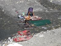 Eine Wäscherin am Straßenrand