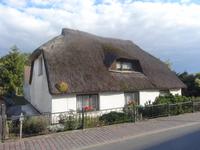 typisch reedgedecktes Haus