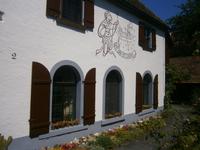Inschrift an der Fassade des Hauses 