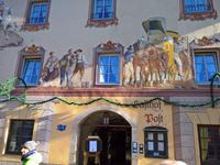 Über dem Gasthof Post die Postkutschen - Lüftllei.