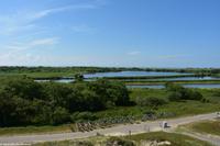 Blick über das Marschland der Insel Norderney in Richtung Wattenmeer und Festland oder 