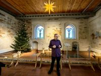 Wir bekommen die Geschichte des Krippenmuseums erklärt 