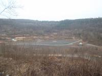 Blick in den Ölschiefer-Tagebau Messel - Ort reicher Fossilienfunde &ndash; &copy; Michael Krause (Eberhardt TRAVEL)