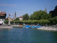 Szene aus dem Hafen im Hintergrund die Stephanskirche und die Turmspitze des Münsters 