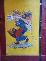 Hauswandkunst der amüsanten Art