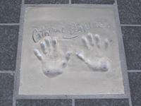Cannes Handabdruck C. Deneuve