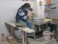 DSCN5930.JPG     Töpfermeister in Aktion