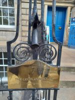 Tülle als Fackellöscher in der Stadtpalast-Umzäunung