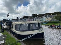 Schwimmende Verkaufsbude auf dem Bude Canal