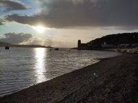 Sonnenuntergang über dem Strand von Oban 