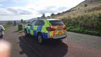 Polizei in den Bergen um Edinburgh