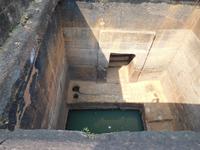 Treppenbrunnen in den Felsen gehauen, buddhistisches Kloster von Udaigiri