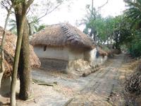 typisches Haus aus Ästen, Bambus und Fluss-Schlamm