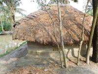 typisches Haus aus Ästen, Bambus und Fluss-Schlamm