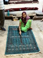 90 Teppichknüpferei