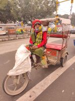 Eine Fahrradrikscha in Neu Delhi, Indien