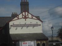 Bahnhofsschild von Llanfair PG in Wales