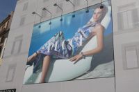 Werbeplakat an der Piazza di Spagna