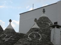 Symbole auf den Trullidächern