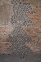 Baudetail Pompei. Ziegel, dazwischen Vulkanstein und darüber Putz