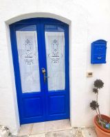 Selbst gestickte Gardinen in Peschici