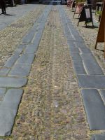 Die Pflasterung des Corso Vittorio Emanuele ist an die früheren Karrenräder angepasst.